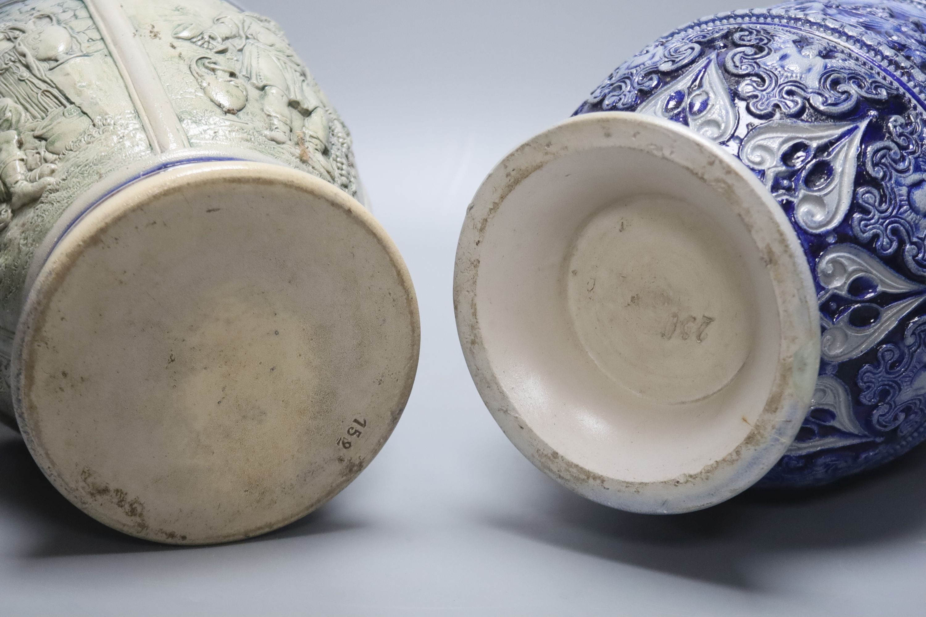 Two large German blue stoneware jugs 36cm
